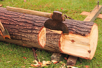 Log With Antique Axes