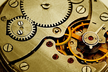 Clockwork details, pinions and wheels closeup