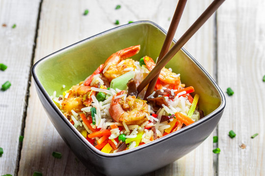 Mix vegetables with rice and shrimp