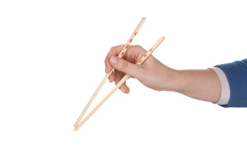 Female hand holding chopsticks with chinese inscription