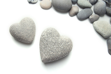 Grey stones in shape of heart, isolated on white