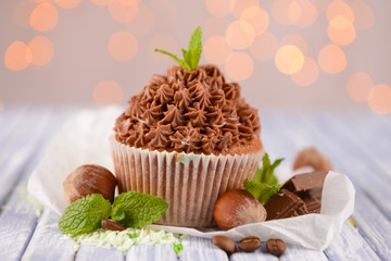 Tasty cupcake with butter cream,