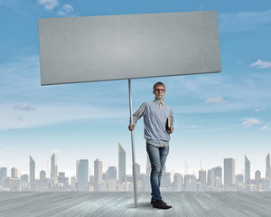 Teenager with banner