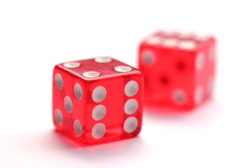 Red transparent dice isolated on white background