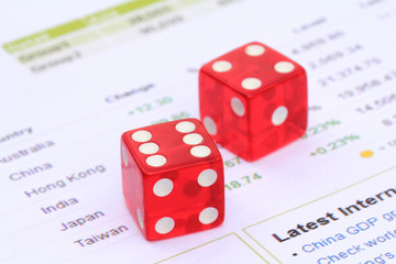 Red transparent dice on business document