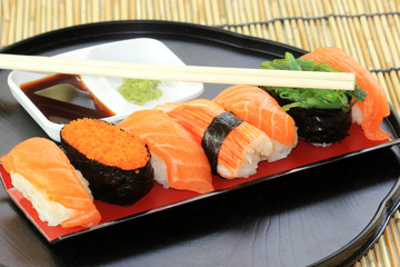 salmon,shrimp,seaweed sushi in the tray