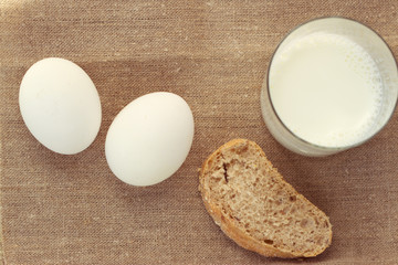 still life with bread and egg, milk