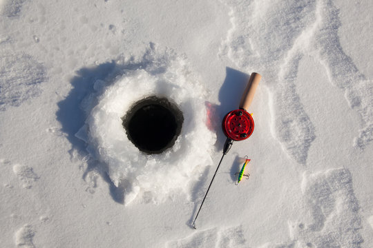 Premium Photo  Hole in ice fishing winter, seasonal abstract
