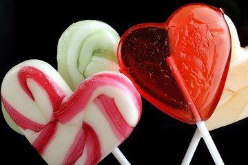 colorful lollipops on a black background