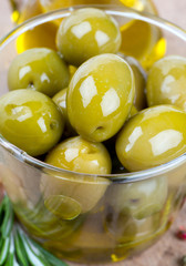 green olives in a glass bowl