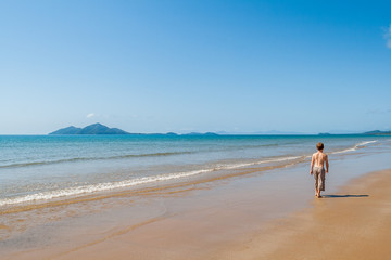 Fototapeta na wymiar Young Boy Explore Blue Beach Islands