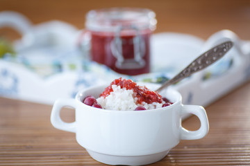 rice porridge with jam and berries