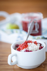 rice porridge with jam and berries