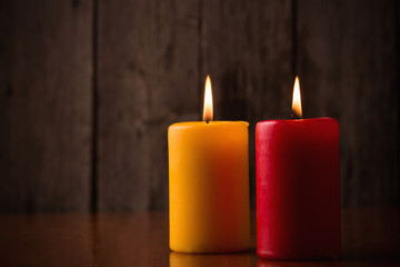 candles on old wooden background