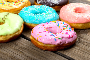 Donuts on a wooden background