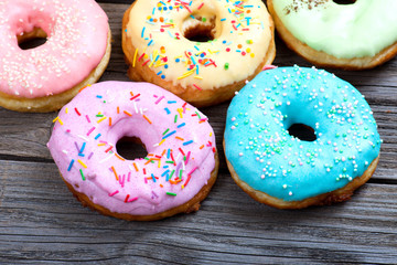 Donuts on a wooden background