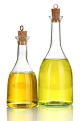 Original glass bottles with salad dressing isolated on white