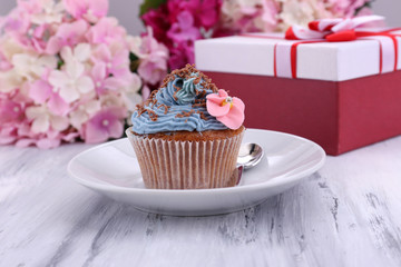 Tasty cupcake with butter cream,