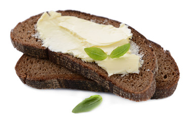 Slices of rye bread with butter, isolated on white