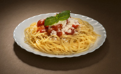 dish with spaghetti and tomato souce