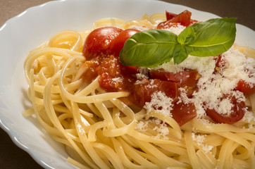 dish with spaghetti and tomato souce