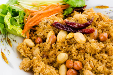 Crispy catfish salad on plate isolated white background