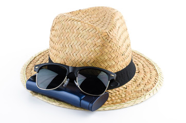 Hat , sunglasses , body lotion isolated on white background