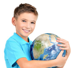 Smiling boy in casual  holding planet earth in hands
