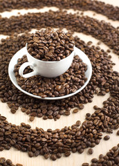 Fototapeta na wymiar Coffee beans in cup