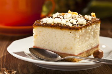 cheesecake with nuts on plate