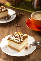 cheesecake with nuts on plate
