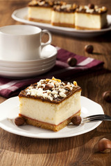cheesecake with nuts on plate