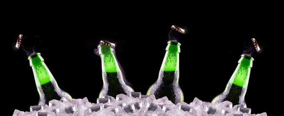 open wet beer bottles on ice