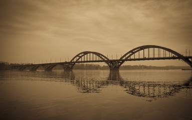 Bridge over river with vignette effect. Retro style image