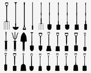 Naklejka premium Black silhouettes of shovels, spades and villas