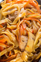 spicy thai noodles with meat and vegetables