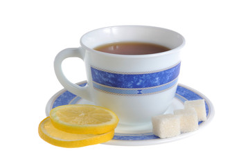 A cup of lemon tea and two slices of lemon, refined sugar on sau