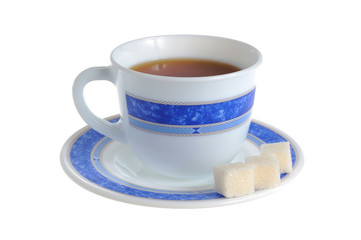 A cup of tea and refined sugar on saucer isolated on white