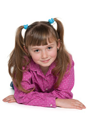 Pensive young girl on the white