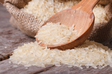 long dry rice macro spill out of the bag on the table