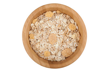 Oat and corn flakes in wooden bowl isolated on white background
