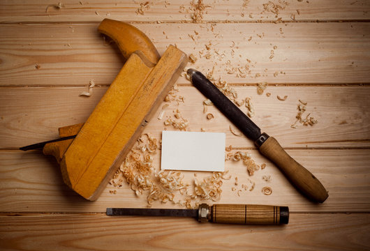Carpentry tools  on wooden background