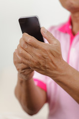 Senior man using phone