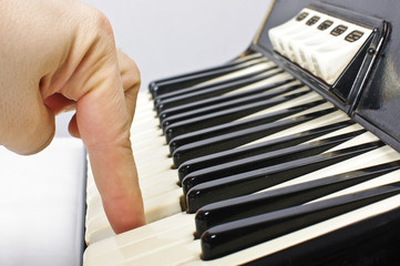 Playing on accordion keyboard