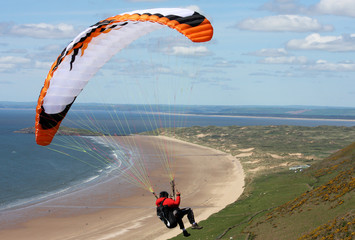 paraglder over Rhossili beach