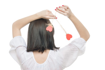 Fototapeta premium Beautifull woman holding hearts smiling