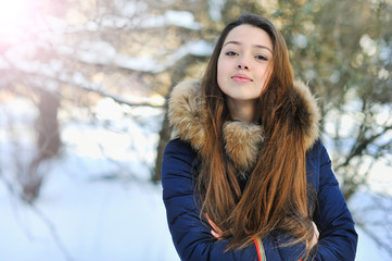 Photo of smiling young happy girl looking at camera
