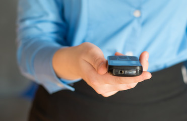 Close up of a woman using mobile smart phone