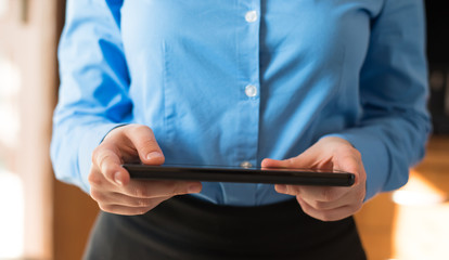woman uses a digital tablet
