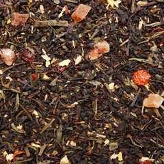 Mix of black and green tea background Aromatic tea with fruits